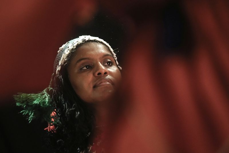 Sudanese Camirata troupe dancer Fatma Farid, 21, whose aunt was killed in 2023 when an explosive fell on their house in al-Obeid, the capital of North Kordofan, performs at the Italian culture center in Cairo, Egypt, Wednesday, July 24, 2024. (AP Photo/Amr Nabil)