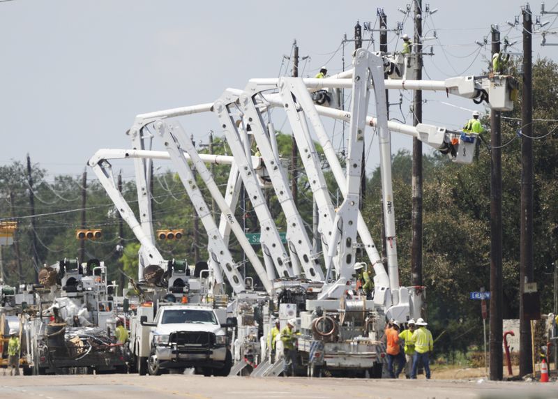 Utility work continues electrical lines along the westbound portion of Spencer Highway near the site of pipeline exposition, Wednesday, Sept. 18, 2024, in La Porte, Texas. (Jason Fochtman/Houston Chronicle via AP)