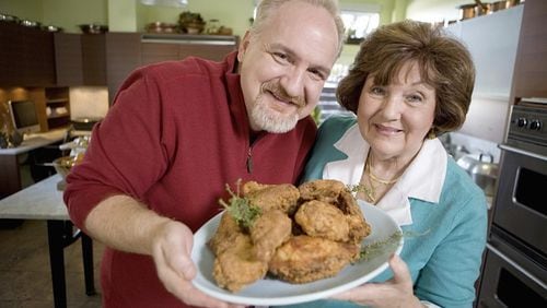 “Fried chicken takes no sides,” says restaurateur Art Smith of Southern Art and Bourbon Bar in Buckhead. “Just as many Republicans have eaten my food as Democrats.” Smith will be the personal chef to Michelle Obama for her author appearance in Atlanta on May 11 at State Farm Arena. He will also be at his Buckhead restaurant for Mother’s Day brunch May 12. Here, he is pictured with his mother, Addie Mae Smith. CONTRIBUTED BY SOUTHERN ART AND BOURBON BAR