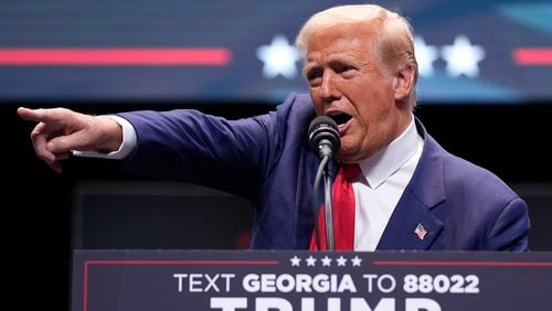 Supporters of Republican presidential nominee Donald Trump claim that Democratic-leaning Savannah officials, such as Mayor Van Johnson, forced the former president to hold his campaign event Tuesday at the city-owned Johnny Mercer Theatre. They say he was denied use of the larger Enmarket Arena where his opponent, Vice President Kamala Harris, held a rally last month. The company that manages both facilities say that isn't true. (Evan Vucci/AP)