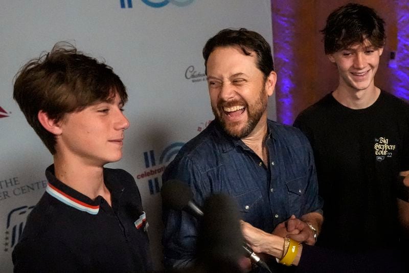 Jason Carter (center) and his sons Thomas Clyde Carter (left) and Henry Lewis Carter (right), attended an event in Atlanta this week honoring his grandfather, former President Jimmy Carter.