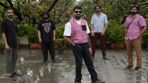 From left, Rohit Gupta, Kartik Pillai, Karan Singh, Suryakant Sawhney, and Dhruv Bhola of Peter Cat Recording Co. pose for a photograph in Mumbai, India, Friday, Aug. 2, 2024. (AP Photo/Rajanish Kakade)