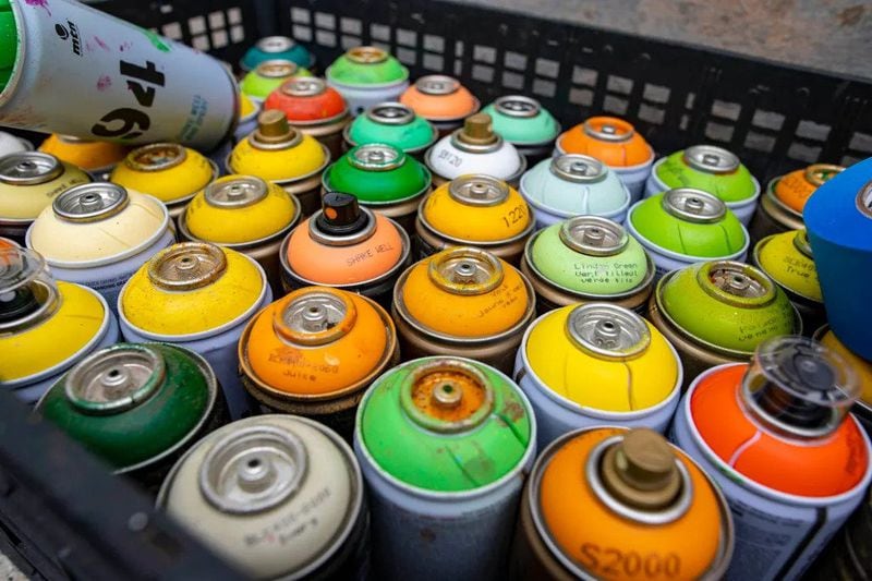 Bongang’s arsenal of spray paint cans. (Photo Courtesy of Isadora Pennington)