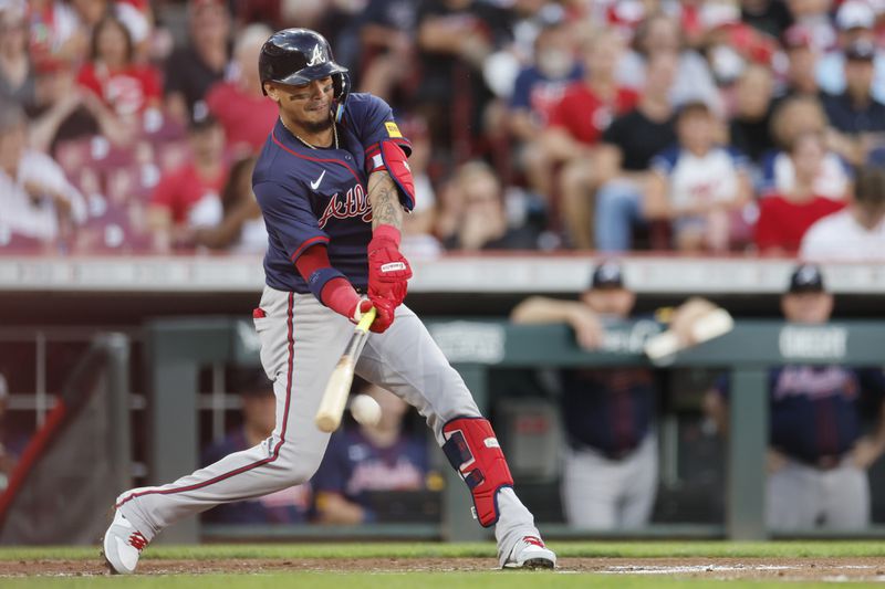 Atlanta Braves' Orlando Arcia hits a ground ball against the Cincinnati Reds during the third inning of a baseball game, Wednesday, Sept. 18, 2024, in Cincinnati. (AP Photo/Jay LaPrete)