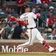 Atlanta Braves shortstop Orlando Arcia hits a two-run home run during the fourth inning against the Philadelphia Phillies at Truist Park, Wednesday, August 21, 2024, in Atlanta. (Jason Getz / AJC)
