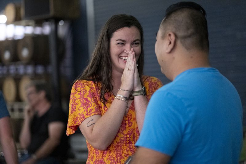 Frances Bullard, a regular at Wilder Smith’s weekly dance class at Wild Heaven, reacts after nailing a dance move with a partner. Ben Gray/ben@bengray.com