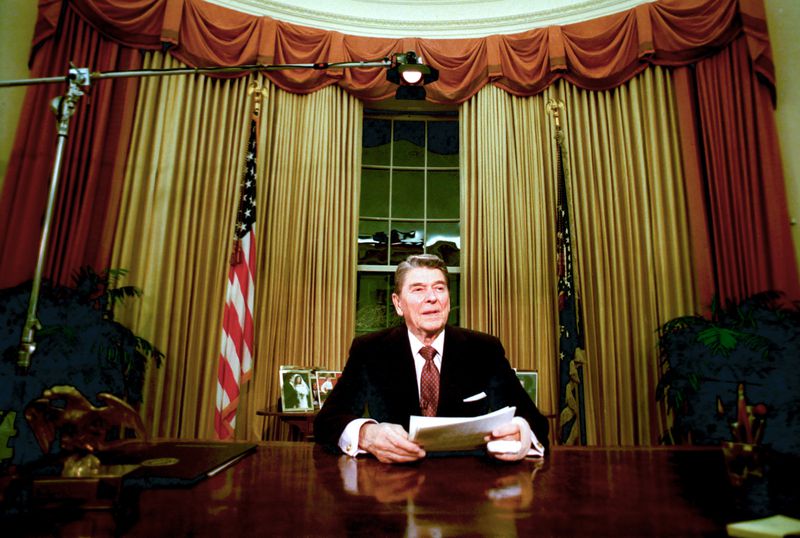 FILE - President Ronald Reagan sits in the Oval Office after he delivered his farewell address to the nation Jan. 11, 1989, from the Oval Office of the White House in Washington. The age question for presidential candidates is more than four decades old. (AP Photo/Ron Edmonds, File)