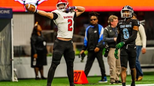 Savannah Chriatian’s Logan Brooking (2) signals first down for his team after a long run during the Class 3A GHSA State Championship game at Mercedes-Benz Stadium, on Wednesday, Dec. 13, 2023, in Atlanta. (Jason Allen for the Atlanta Journal Constitution)