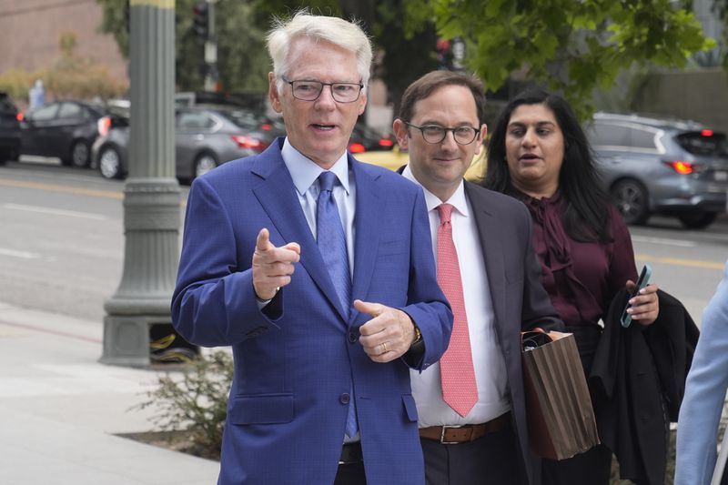 CBS Sports Chairman Sean McManus arrives at federal court Tuesday, June 18, 2024, in Los Angeles. McManus is testifying in a class-action lawsuit filed by "Sunday Ticket" subscribers claiming the NFL broke antitrust laws. (AP Photo/Damian Dovarganes)