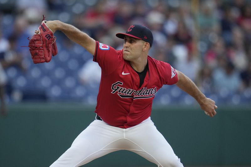 FILE -Cleveland Guardians' Matthew Boyd pitches in the first inning of a baseball game against the Minnesota Twins, Monday, Sept. 16, 2024, in Cleveland. (AP Photo/Sue Ogrocki, File)