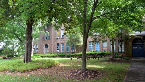 The future of the former Hubert Elementary School property on Memorial Drive in Atlanta has been a subject of close scrutiny for several years. In June, the Atlanta Board of Education agreed to lease the parking lot on the site to a construction company working on a nearby project. KENT D. JOHNSON/AJC/2014 file photo