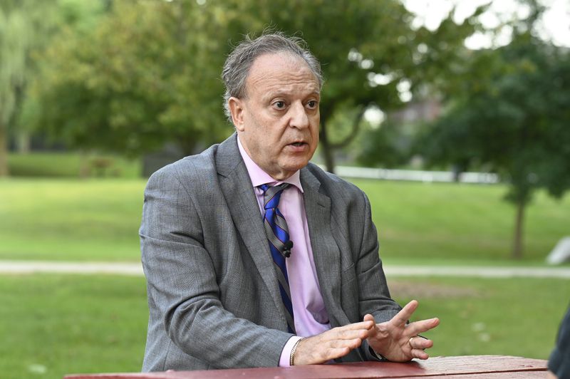 Bishara Bahbah, national chairman for Arab Americans for Trump, answers questions during an interview, Wednesday, Aug. 14, 2024, in Dearborn, Mich. (AP Photo/Jose Juarez)