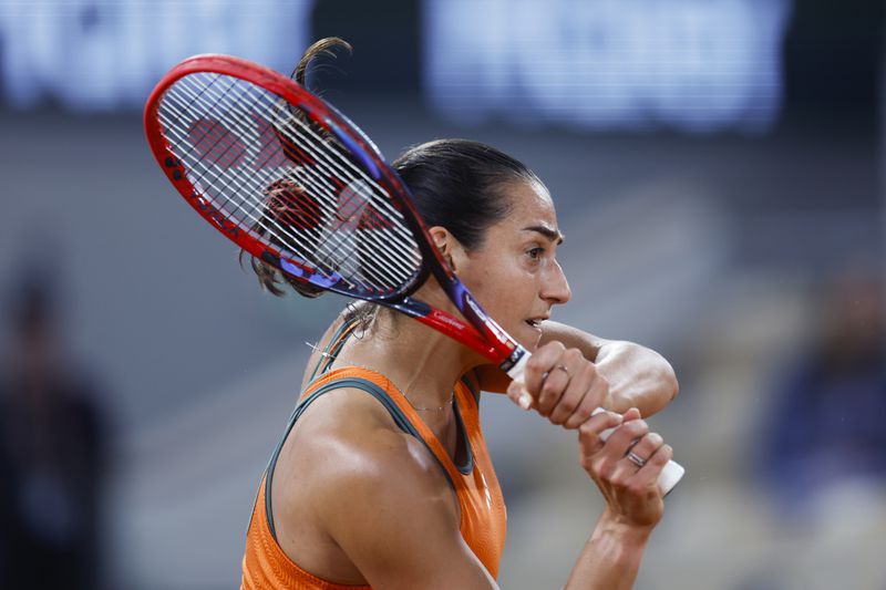 France's Caroline Garcia plays a shot against Germany's Eva Lys during their first round match of the French Open tennis tournament at the Roland Garros stadium in Paris, Sunday, May 26, 2024. (AP Photo/Jean-Francois Badias)