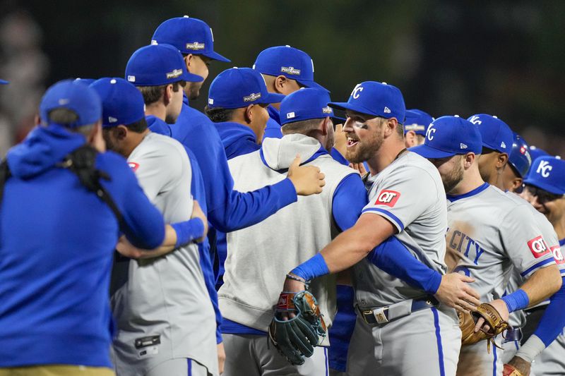 Kansas City Royals outfielder Hunter Renfroe, center, celebrates with teammates following Game 2 of an AL Wild Card Series baseball game against the Baltimore Orioles, Wednesday, Oct. 2, 2024 in Baltimore. The Royals won 2-1. (AP Photo/Stephanie Scarbrough)