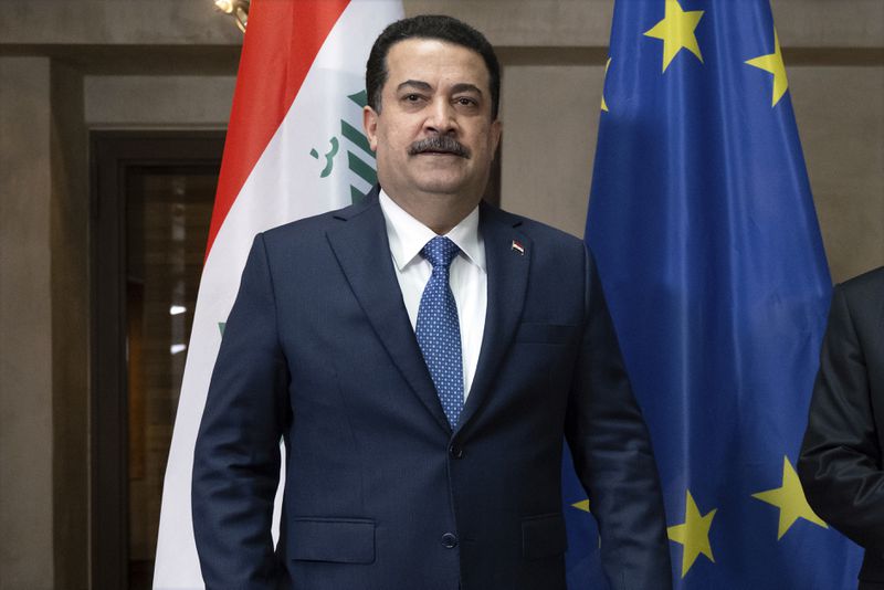 FILE - Iraqi Prime Minister Mohammed al-Sudani poses for a photo at the Munich Security Conference in Munich, Germany, Feb. 17, 2024. (Sven Hoppe/DPA via AP, Pool, File)