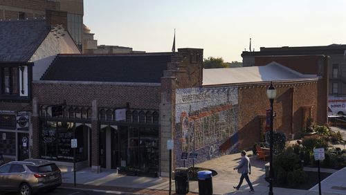 A man walks through Downtown Springfield, Ohio, Monday, Sept. 16, 2024. (AP Photo/Jessie Wardarski)