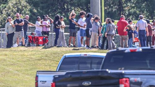 Four people were killed and nine others taken to various hospitals in a shooting at Apalachee High School in Barrow County, the GBI said Wednesday afternoon. (John Spink/AJC)