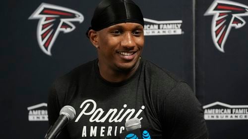 Atlanta Falcons quarterback Michael Penix Jr. (9) speaks during a post game news conference following a pre season NFL football game Miami Dolphins, Friday, Aug. 9, 2024, in Miami Gardens, Fla. (AP Photo/Lynne Sladky)