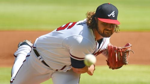 May 22, 2021 Atlanta - Atlanta Braves starting pitcher Bryse Wilson throws a pitch in the first inning against Pittsburgh Pirates at Truist Park on Saturday, May 22, 2021. (Hyosub Shin / Hyosub.Shin@ajc.com)
