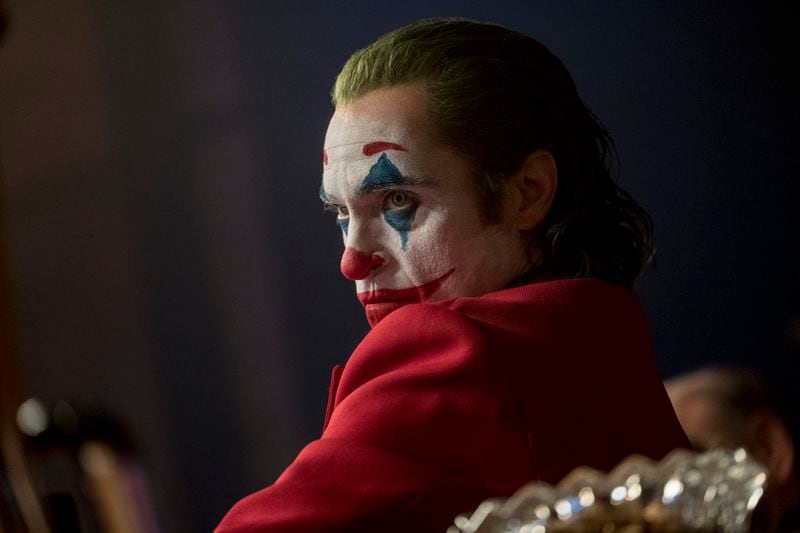 This image released by Warner Bros. Pictures shows Joaquin Phoenix in a scene from "Joker." (Niko Tavernise/Warner Bros. Pictures via AP)