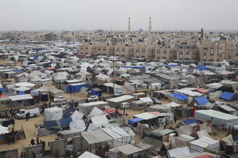 FILE - A tent camp housing Palestinians displaced by the Israeli offensive is seen in Rafah, Gaza Strip, Tuesday, Feb. 27, 2024. (AP Photo/Hatem Ali, File)