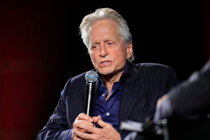 FILE - Michael Douglas speaks at the 76th international film festival, Cannes, southern France, May 17, 2023. Celebrities including Douglas are increasingly lending their star power to President Joe Biden, hoping to energize fans to vote for him in November 2024 or entice donors to open their checkbooks for his reelection campaign. (AP Photo/Daniel Cole, File)