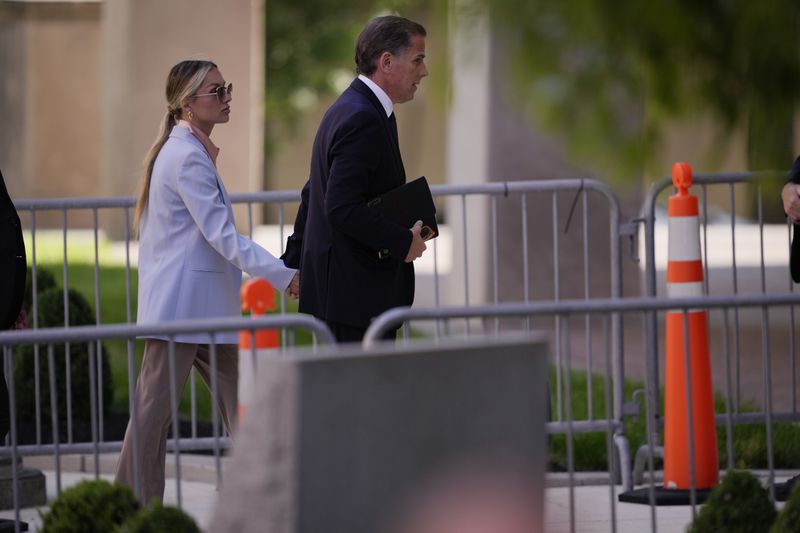 Hunter Biden and his wife, Melissa Cohen Biden arrive at federal court, Tuesday, June 4, 2024, in Wilmington, Del. (AP Photo/Matt Rourke)