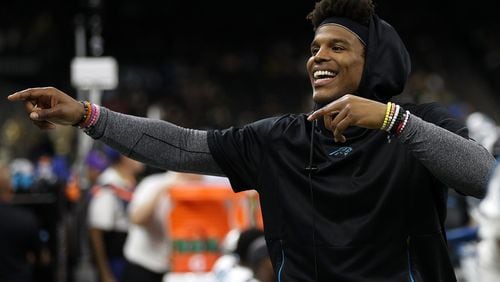 Cam Newton #1 of the Carolina Panthers talks with fans during the game against the New Orleans Saints during the first half at the Mercedes-Benz Superdome on December 30, 2018 in New Orleans, Louisiana. (Photo by Chris Graythen/Getty Images)