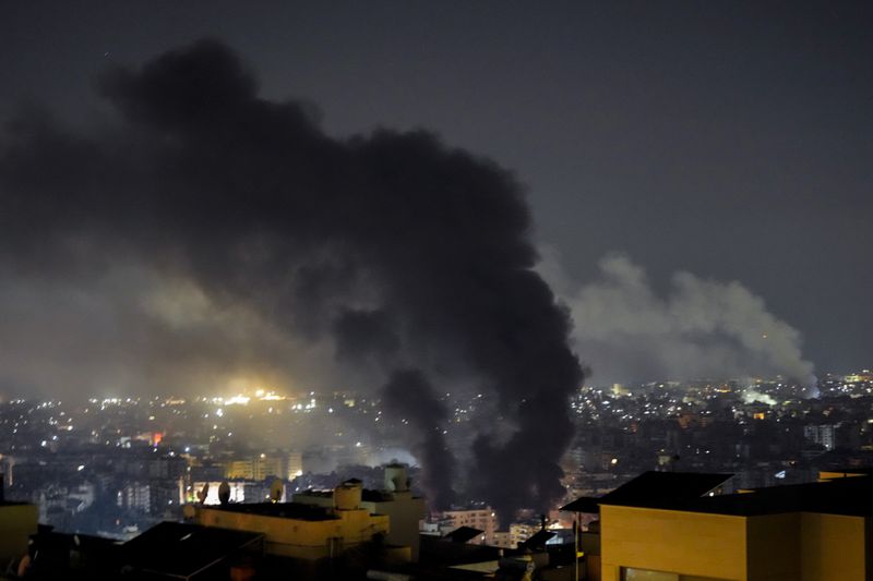 Smoke rises from Israeli airstrikes in Beirut's southern suburbs, Lebanon, Saturday, Sept. 28, 2024. (AP Photo/Hassan Ammar)