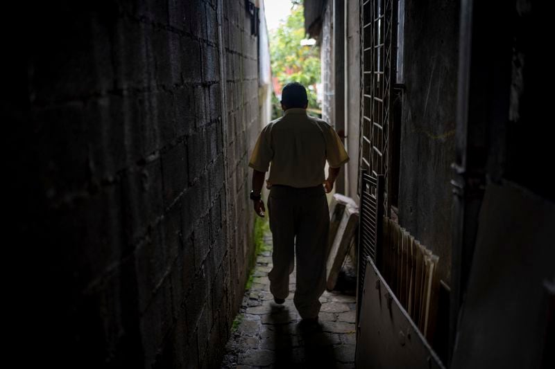 Nicaraguan exile Francisco Alvicio, a deacon of Nicaragua's Moravian Church, walks to his rented room in San Jose, Costa Rica, Sunday Sept. 22, 2024. (AP Photo/Carlos Herrera)