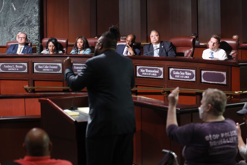 Atlanta City Council members listen to David Franklin from the Southern Center for Human Rights during the public comments sessions before voting 11-4 to approving funding for a public safety training center. (Miguel Martinez/The Atlanta Journal-Constitution)