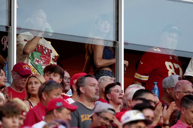 Taylor Swift is seen in a suite before the start of an NFL football game between the Kansas City Chiefs and the Baltimore Ravens Thursday, Sept. 5, 2024, in Kansas City, Mo. (AP Photo/Ed Zurga)