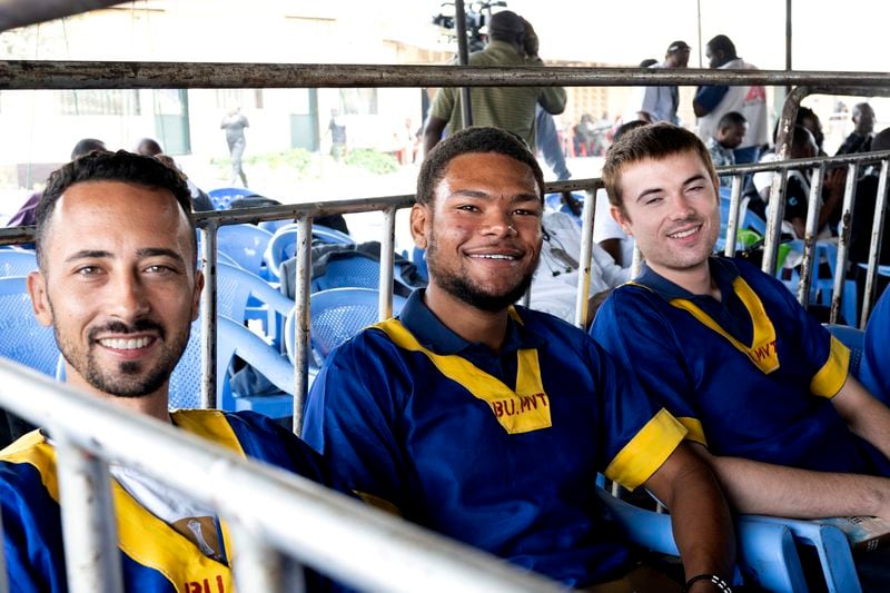 Tyler Thompson, left, Marcel Malanga and Benjamin Reuben Zalman-Polun, all American citizens, attend a court verdict in Congo, Kinshasa, Friday Sept .13, 2024, on charges of taking part in a coup attempt in May 2024. (AP Photo/Samy Ntumba Shambuyi)