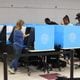 Voters cast their ballots at The Nett Church at Berkmar Church in Lilburn. PHIL SKINNER FOR THE ATLANTA JOURNAL-CONSTITUTION