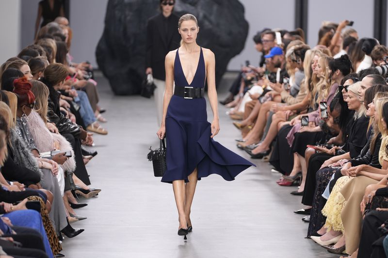 A model walks the runway during the Michael Kors Collection spring/summer 2025 fashion show as part of New York Fashion Week, Tuesday, Sept. 10, 2024, in New York. (AP Photo/Pamela Smith)