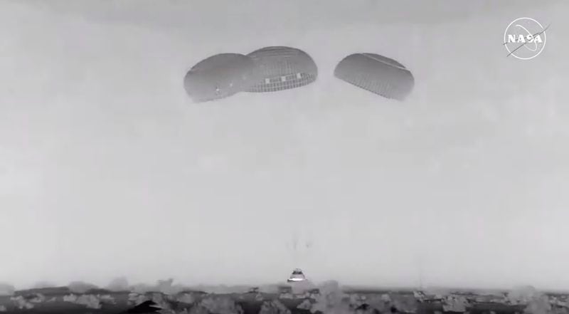 In this image from video provided by NASA, the empty Boeing Starliner capsule touches down at White Sands Missile Range in New Mexico late Friday, Sept. 6, 2024, after undocking from the International Space Station. (NASA via AP)