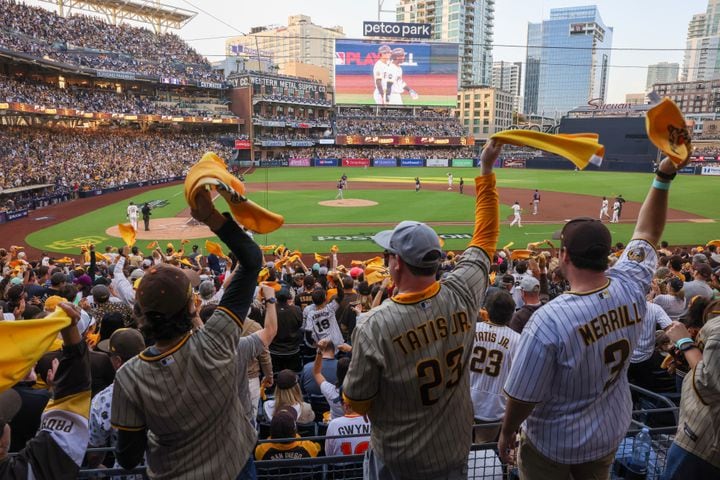 San Diego Padres fans cheer as Atlanta Braves pitcher Max Fried delivers during the first inning of National League Division Series Wild Card Game Two at Petco Park in San Diego on Wednesday, Oct. 2, 2024.   (Jason Getz / Jason.Getz@ajc.com)