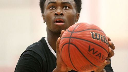 Wheeler's Jaylen Brown attempts a free throw in a game against North Gwinnett on February 27, 2014. Jason Getz / Special to the AJC Wheeler's Jaylen Brown. ( Jason Getz / Special to AJC)