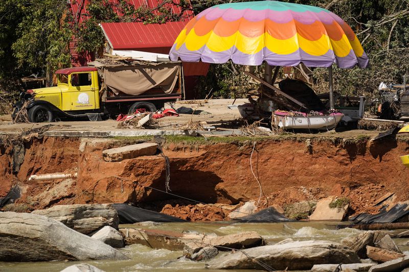 Debris is seen in the aftermath of Hurricane Helene, Wednesday, Oct. 2, 2024, in Chimney Rock Village, N.C. (AP Photo/Mike Stewart)