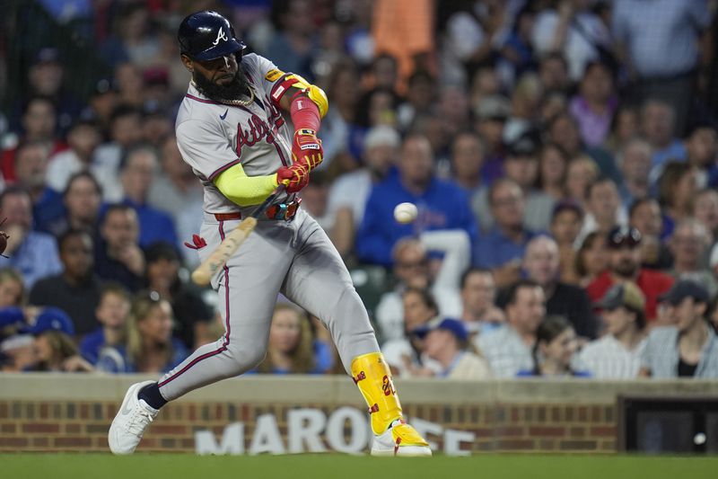 Atlanta Braves designated hitter Marcell Ozuna hits a three-run home run during the seventh inning of a baseball game against the Chicago Cubs, Wednesday, May 22, 2024, in Chicago. (AP Photo/Erin Hooley)