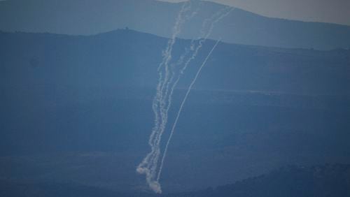 Israeli Iron Dome air defense system fires to intercept rockets that were launched from Lebanon, in northern Israel, Saturday, Sept. 21, 2024. (AP Photo/Leo Correa)