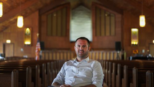 FILE - Pastor Ryan Burge, an associate professor of political science at Eastern Illinois University and author of "The Nones," poses for a portrait at at First Baptist Church in Mt. Vernon, Ill., Sept. 10, 2023. (AP Photo/Jessie Wardarski, File)