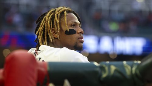 Atlanta Braves right fielder Ronald Acuña Jr. watches the action in the dugout during the third inning against the Chicago Cubs at Truist Park, Monday, May 13, 2024, in Atlanta. (Jason Getz / AJC)
