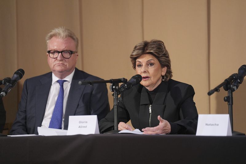 Members of the legal team, Dean Armstrong KC and American attorney Gloria Allred, who featured in 'Al-Fayed: Predator at Harrods' hold a press conference to discuss their involvement in the investigation and the legal claim against Harrods for failing to provide a safe system of work for their employees, at Kent House in Knightsbridge, London, Friday Sept. 20, 2024. Multiple ex-Harrods employees have accused Mohamed Al Fayed, the Egyptian billionaire who owned the luxury department store for more than 25 years, of rape and sexual assault. (Yui Mok/PA via AP)