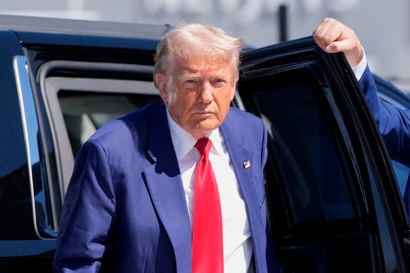 Republican presidential nominee former President Donald Trump arrives at Harry Reid International Airport to board a plane after a campaign trip, Saturday, Sept.14, 2024, in Las Vegas. (AP Photo/Alex Brandon)