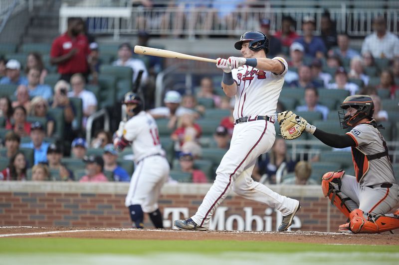Atlanta Braves' Sean Murphy (12) hits a solo home run in the second inning of a baseball game against the San Francisco Giants, Tuesday, July 2, 2024, in Atlanta. (AP Photo/Brynn Anderson)