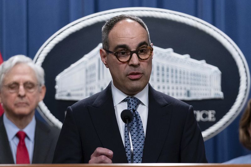 Assistant Attorney General Jonathan Kanter of the Justice Department's Antitrust Division speaks during a news conference at the Department of Justice headquarters in Washington, Thursday, May 23, 2024. The Justice Department has filed a sweeping antitrust lawsuit against Ticketmaster and parent company Live Nation Entertainment, accusing them of running an illegal monopoly over live events in America and driving up prices for fans. The lawsuit was filed Thursday in New York and was brought with 30 state and district attorneys general. (AP Photo/Jose Luis Magana)