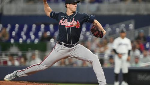 Braves starting pitcher Kyle Wright (30) aims a pitch against the Miami Marlins, Wednesday, May 3, 2023, in Miami. (AP Photo/Marta Lavandier)