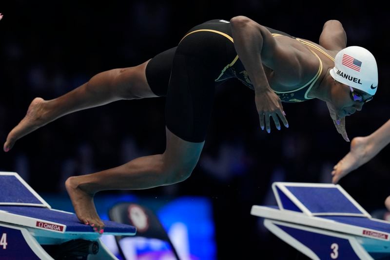 Simone Manuel swims during a Women's 100 freestyle semifinals heat Tuesday, June 18, 2024, at the US Swimming Olympic Trials in Indianapolis. (AP Photo/Darron Cummings)
