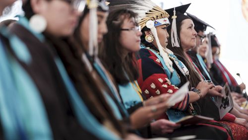 This photo provided by Jason S. Ordaz shows a commencement ceremony at the Institute of American Indian Arts in Santa Fe, N.M., in May 2019. (Jason S. Ordaz/Institute of American Indian Arts via AP)